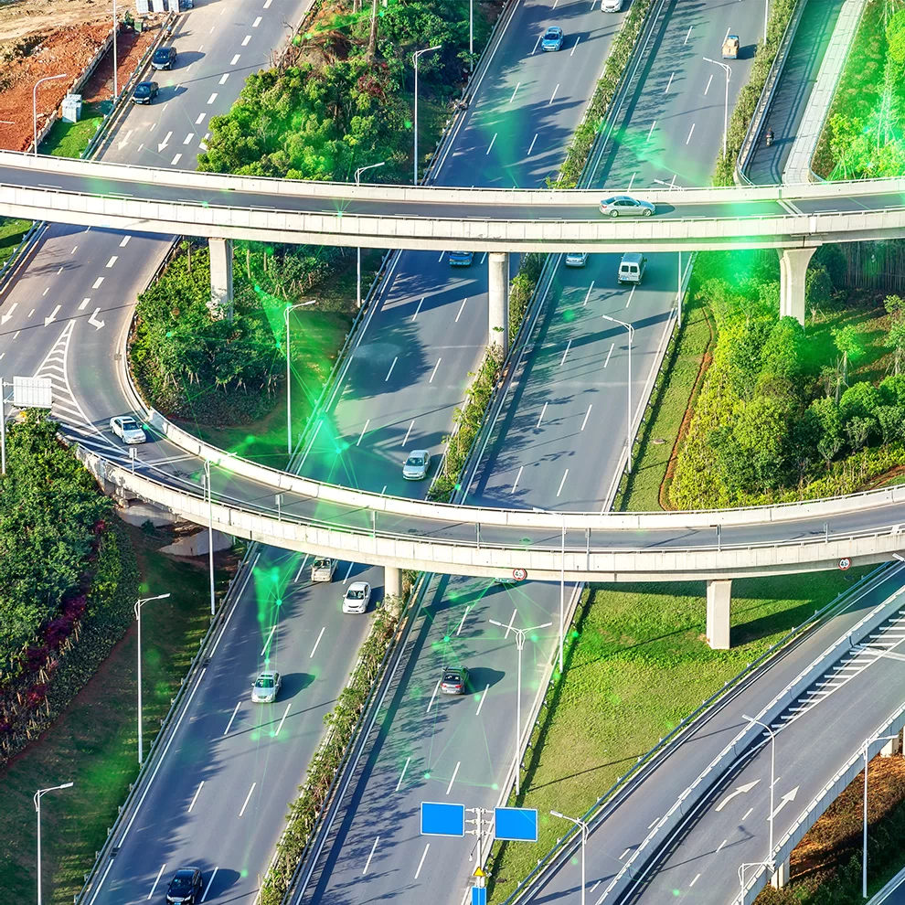 aerial view of motorways with green plexus overlayed