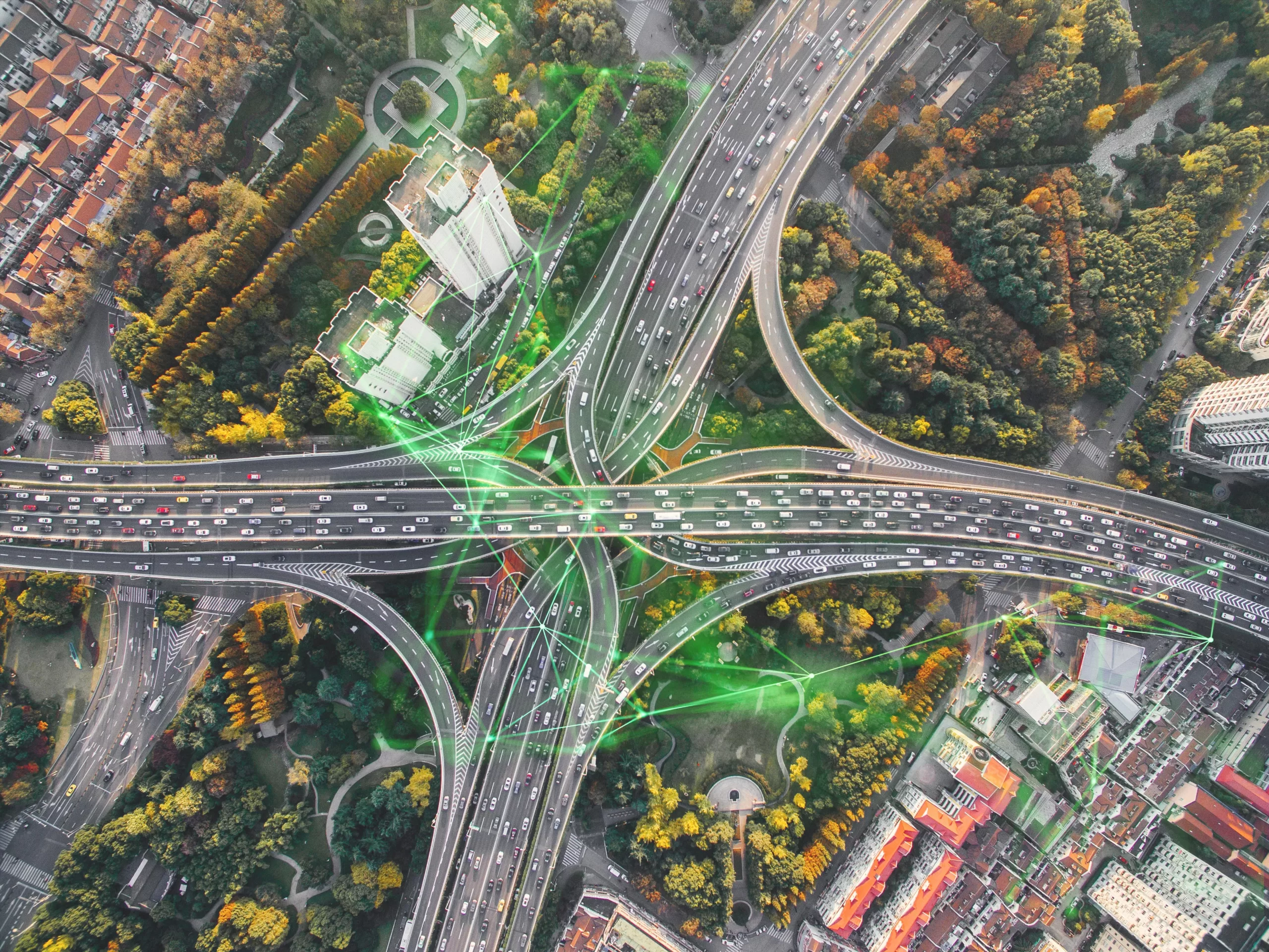 aerial view of highway with green plexus