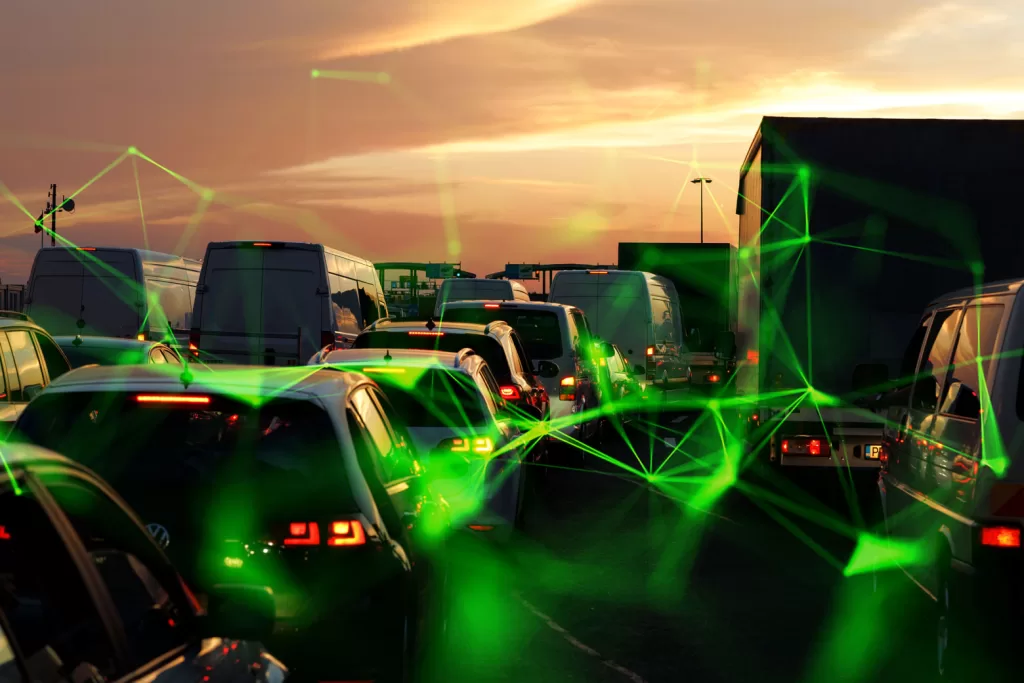 vehicles in traffic jam at sunset with green plexus overlayed