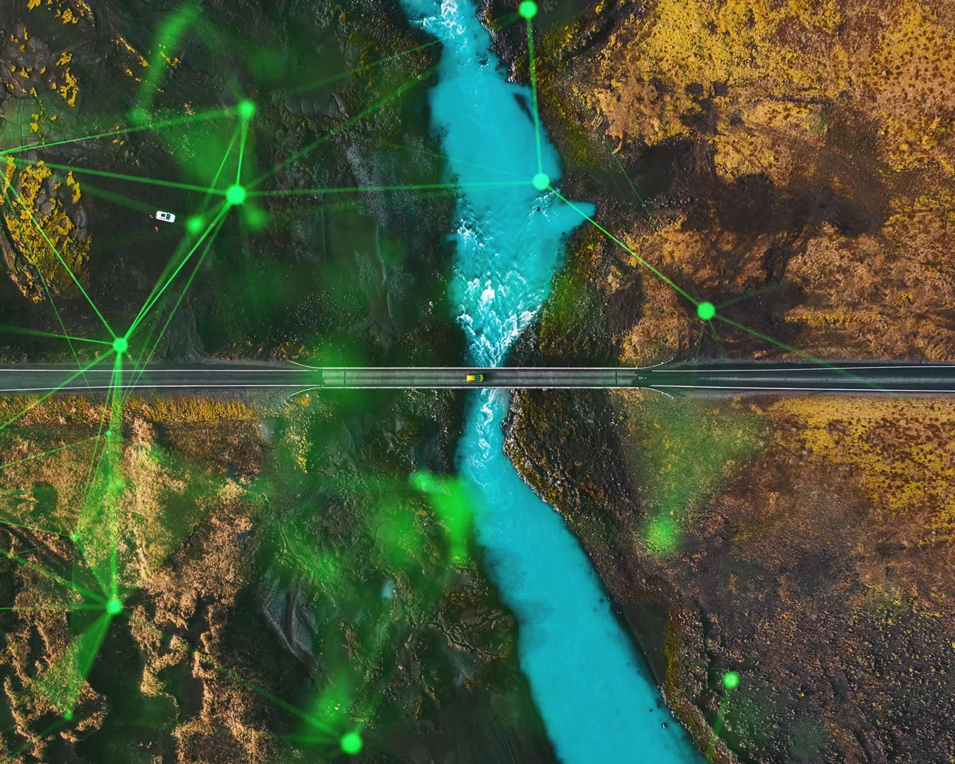 aerial view of car crossing bridge over lake between two mountains green plexus overlayed