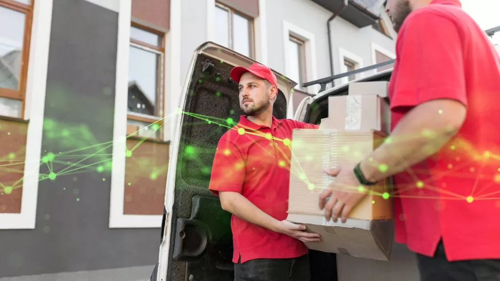 low angle delivery man holding box green plexus