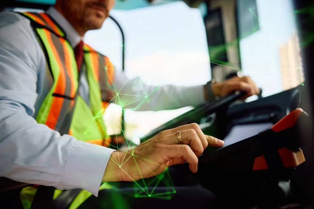 man-tracking-delivery-route-in-lorry-green-plexus