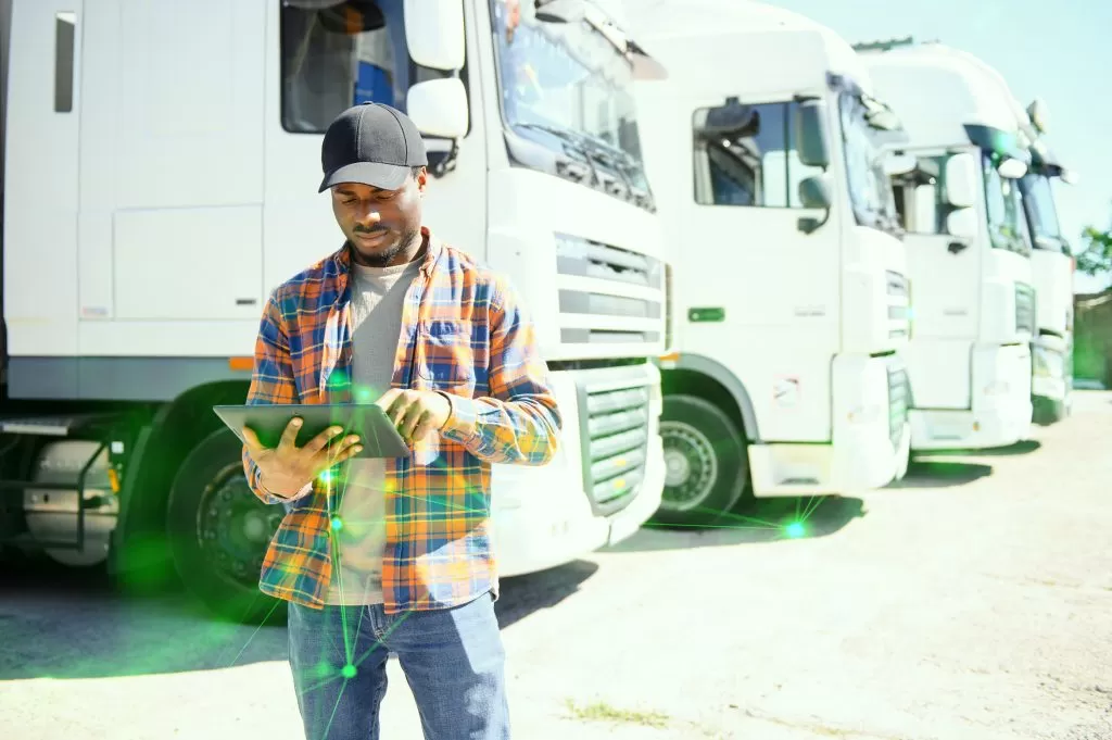 portrait-african-american-men-happy-smiling-confident-positive-standing-near-lorry-green-plexus